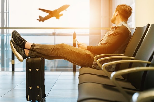 Drive My Car Home from Auckland Airport | Dial a Driver 1 Traveller relaxing at the airport after landing